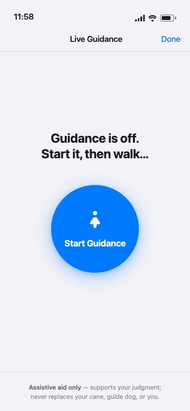 Development-build screenshot of the ChatLemur app's Live Guidance screen on iPhone: iOS status bar showing 11:58, a &lsquo;Live Guidance&rsquo; title with a &lsquo;Done&rsquo; button, the heading &lsquo;Guidance is off. Start it, then walk…&rsquo;, a large blue circular &lsquo;Start Guidance&rsquo; button with a walking-figure icon and the full &lsquo;Start Guidance&rsquo; label visible without any clipping, and an &lsquo;Assistive aid only — supports your judgment; never replaces your cane, guide dog, or you&rsquo; note at the bottom.
